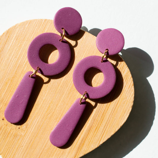 The "Packs a Punctuation" Earrings in Grape
